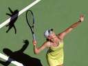 girl playing tennis cat shadow