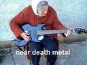 old lady playing guitar heavy metal music